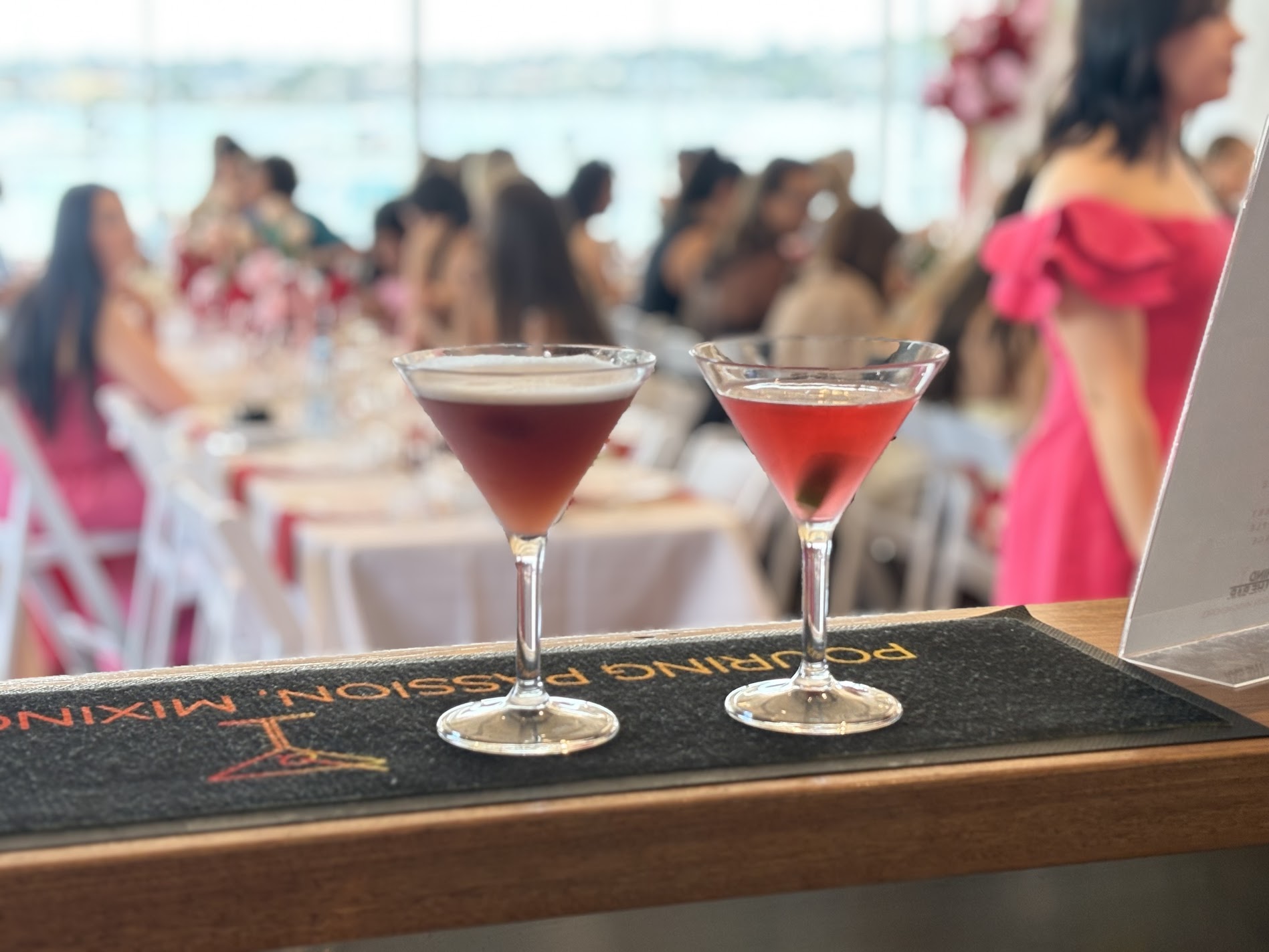 Espresso and cosmo martinis on bar mat
