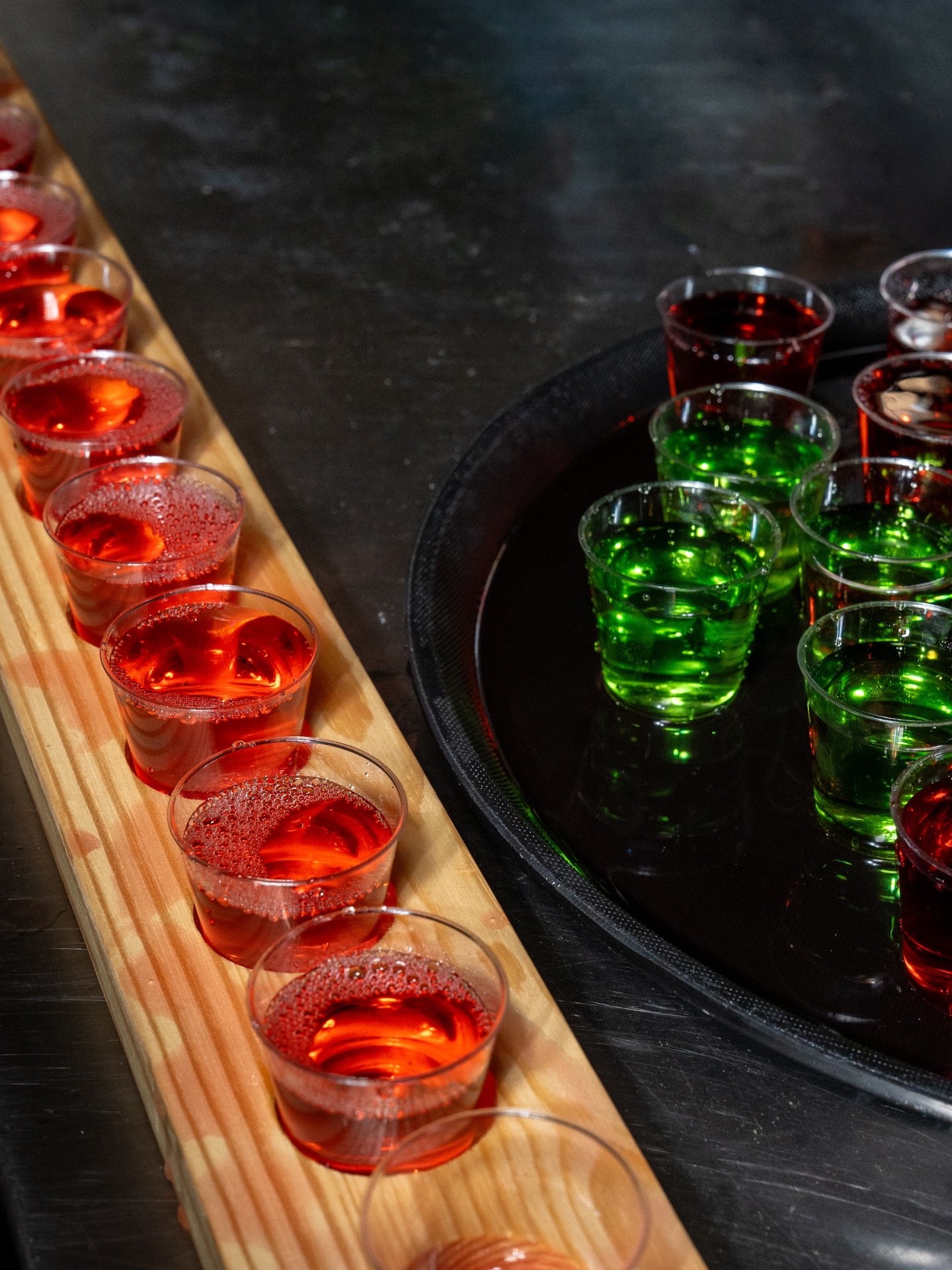 Red and green jelly shots lined up